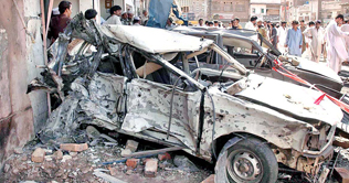  12 killed, 40 injured in 2 bomb blasts in peshawar